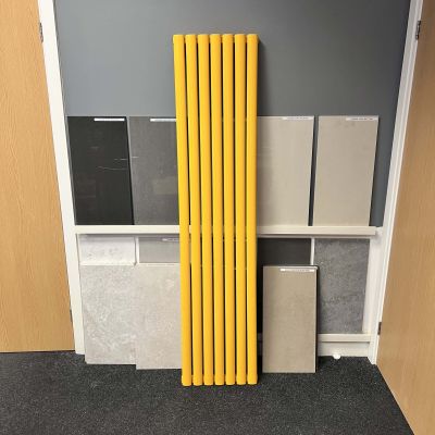 The Tap factory Vibrance 7 panel radiator in mustard yellow